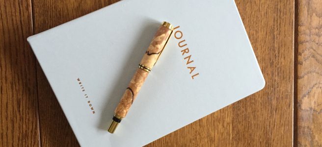 journal with fountain pen, write it down